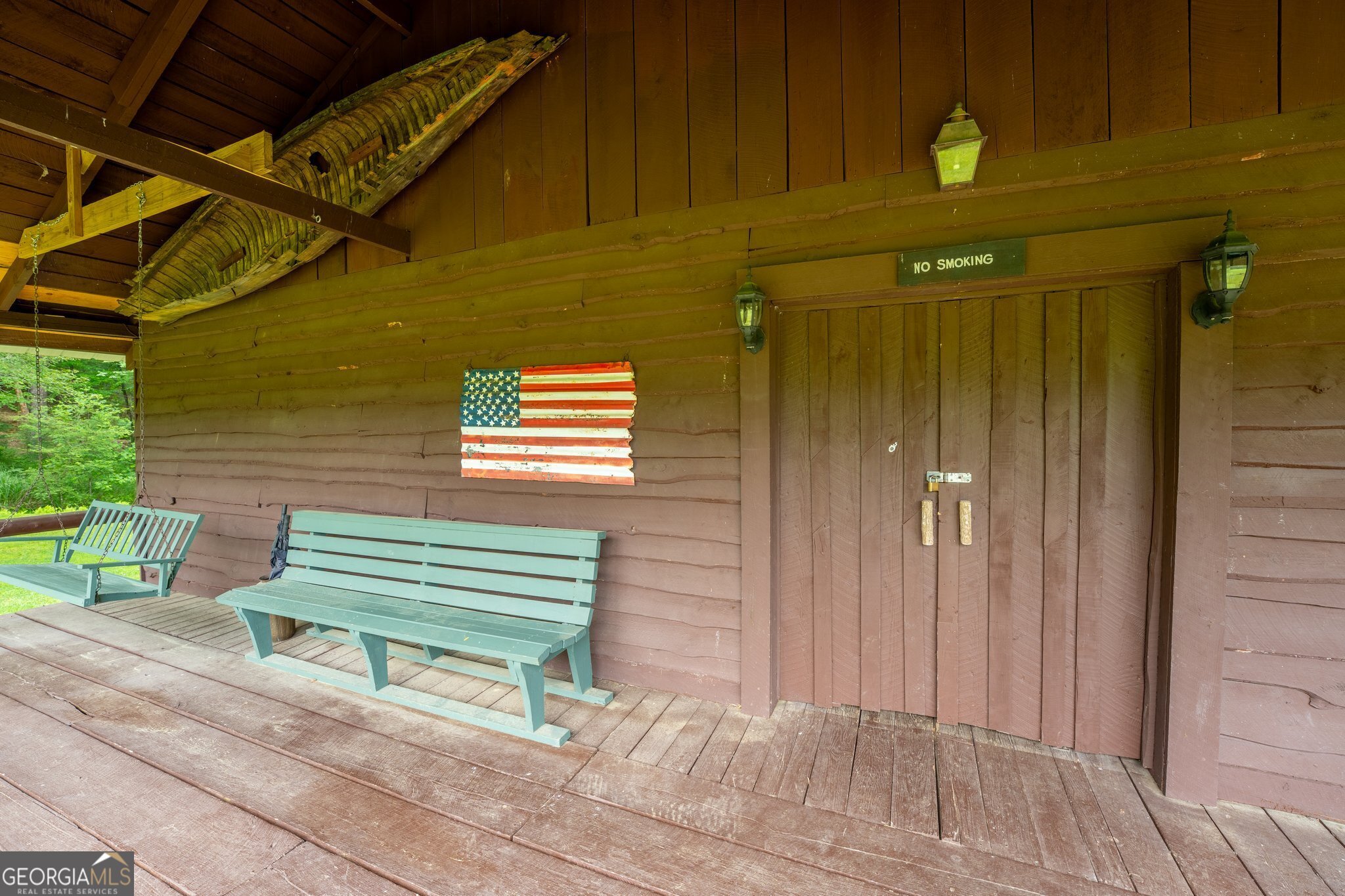 0 Grizzly Ridge Road Lakemont, GA 30552 - Photo 57 of 75 a green bench sitting in front of a building