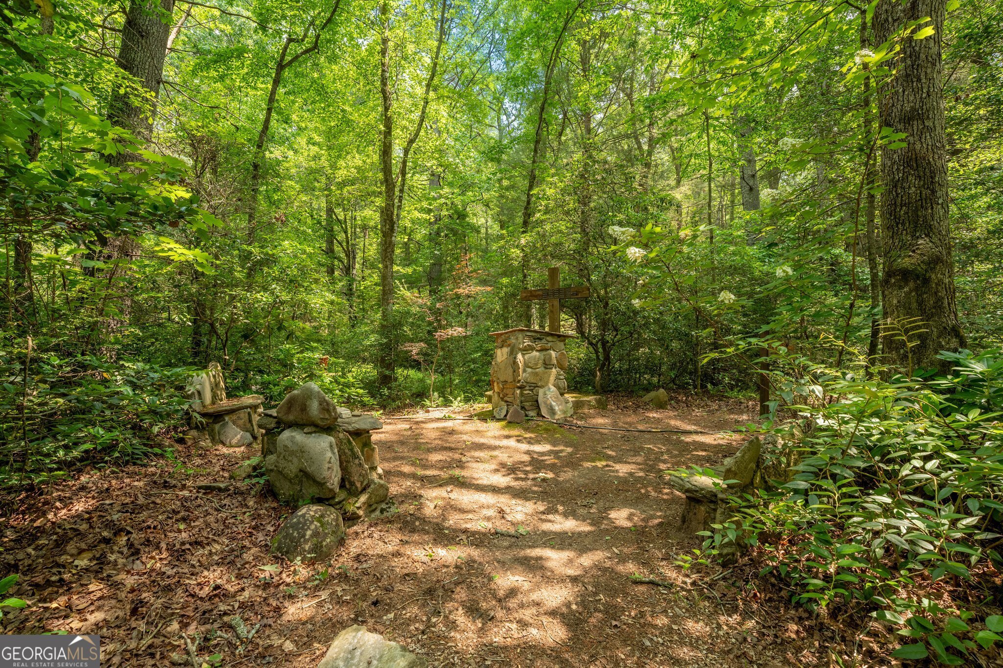 0 Grizzly Ridge Road Lakemont, GA 30552 - Photo 72 of 75 a backyard of a house with table and chairs