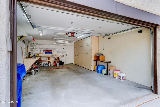 a bedroom with bed and window