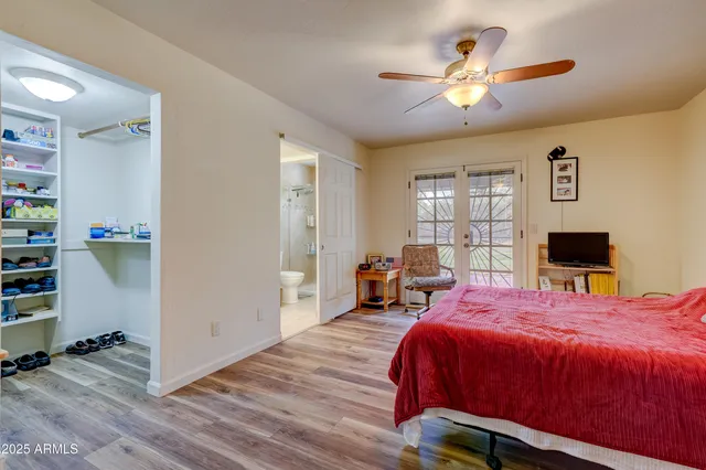 a room with furniture and a flat screen tv