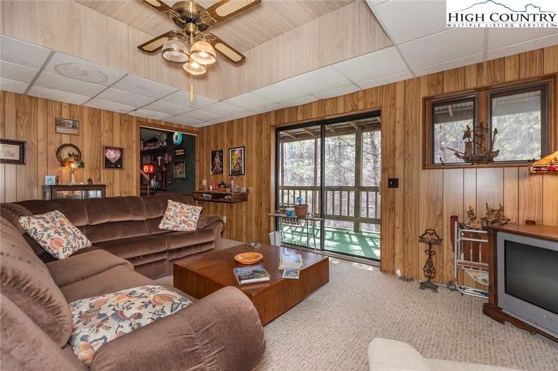 184 Birch Lane Deep Gap, NC 28618 - Photo 20 of 31 a living room with furniture and a flat screen tv