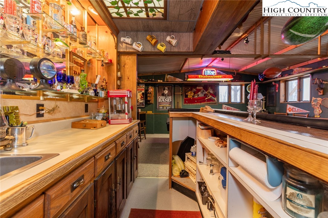 184 Birch Lane Deep Gap, NC 28618 - Photo 26 of 31 a view of a kitchen with a sink and wooden floor