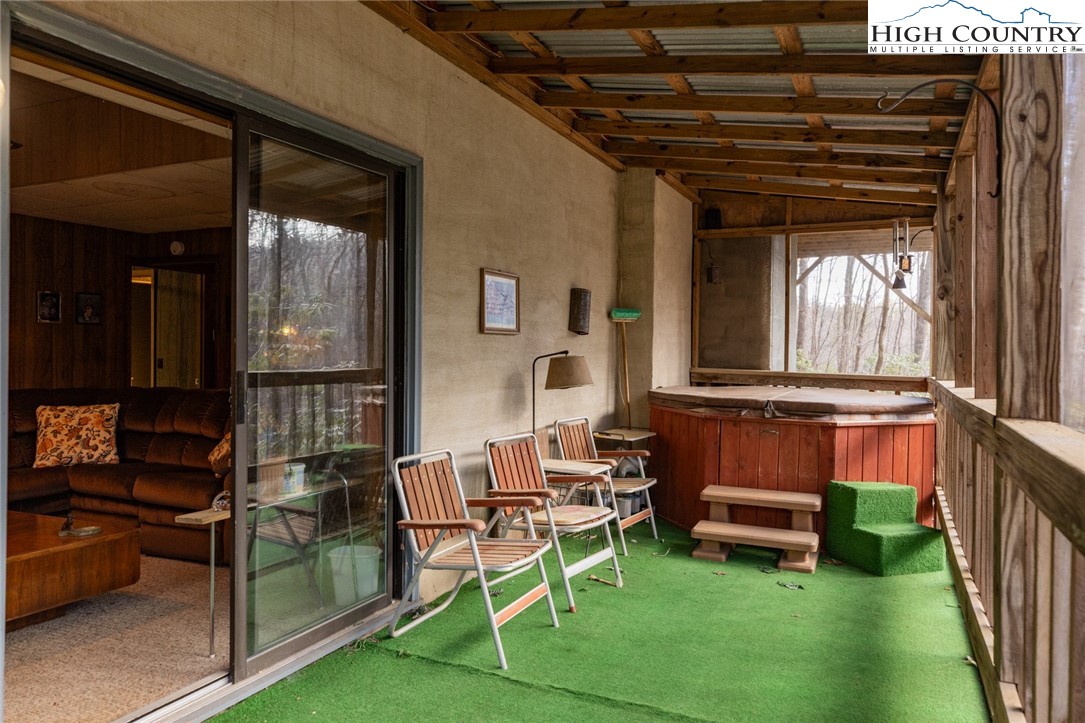184 Birch Lane Deep Gap, NC 28618 - Photo 28 of 31 a backyard of a house with outdoor seating