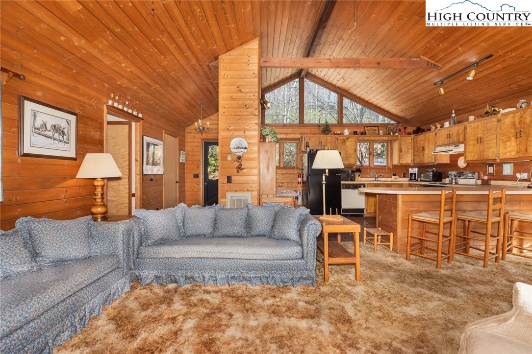 184 Birch Lane Deep Gap, NC 28618 - Photo 4 of 31 a living room with furniture and a large window