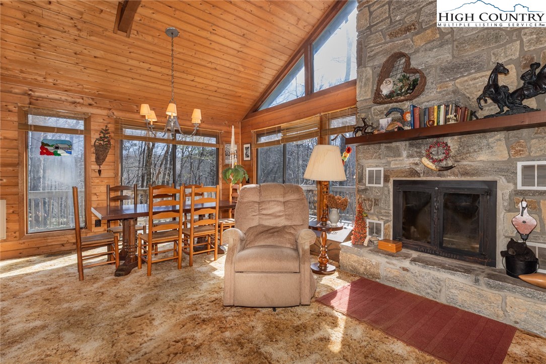 184 Birch Lane Deep Gap, NC 28618 - Photo 5 of 31 a living room with furniture and a fireplace