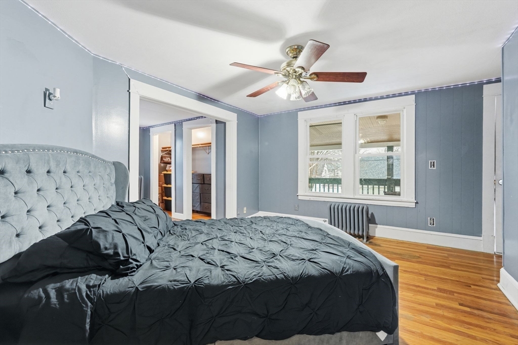 34 Savoy Avenue Springfield, MA 01104 - Photo 17 of 35 a bedroom with a bed dresser and a window