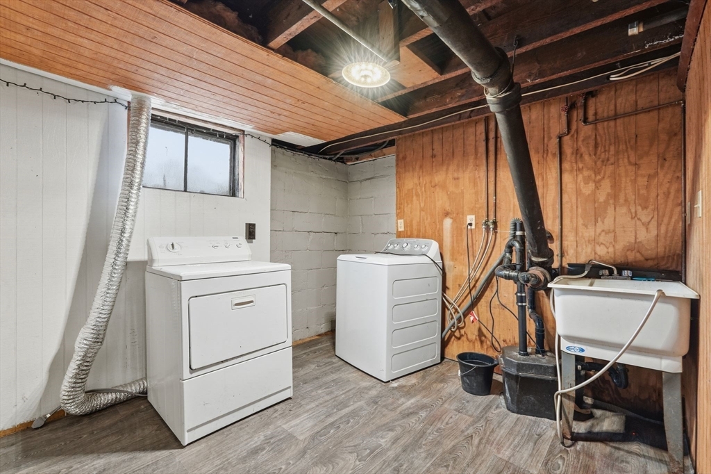 34 Savoy Avenue Springfield, MA 01104 - Photo 26 of 35 a utility room with dryer and washer