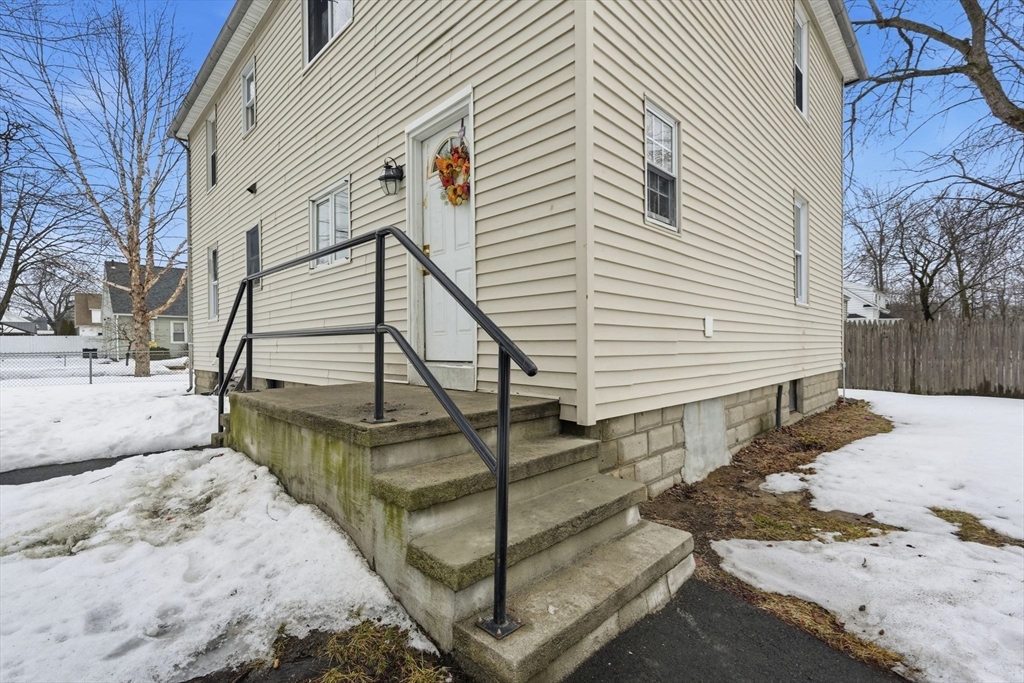 34 Savoy Avenue Springfield, MA 01104 - Photo 27 of 35 a view of a house with a snow on the wall