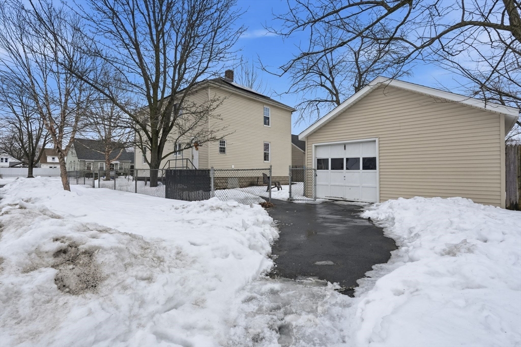 34 Savoy Avenue Springfield, MA 01104 - Photo 28 of 35 a view of a house with snow on the house