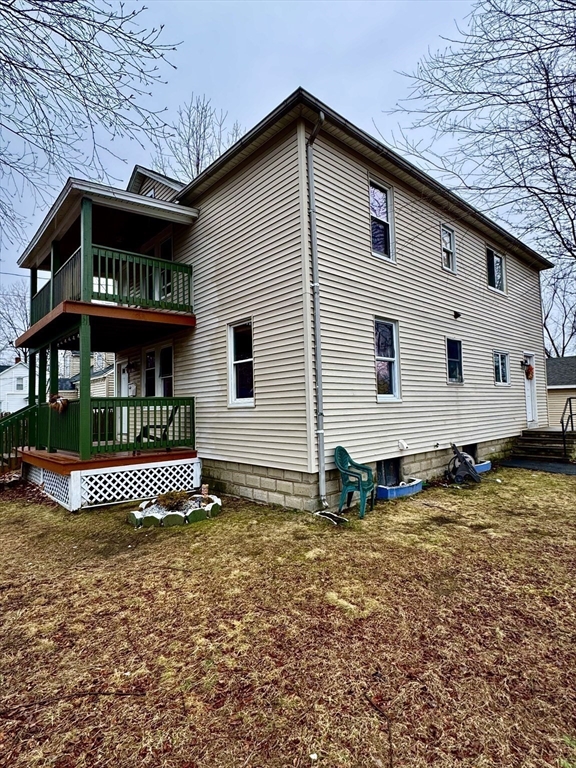34 Savoy Avenue Springfield, MA 01104 - Photo 31 of 35 a front view of a house with garden