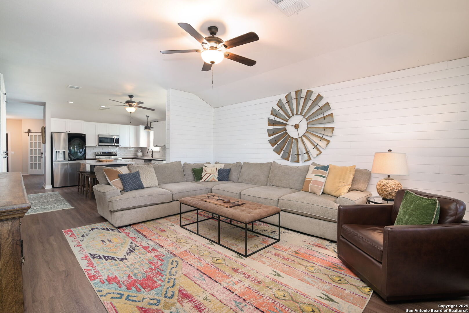 3796 Pebble Beach Cibolo, TX 78108 - Photo 11 of 21 a living room with furniture kitchen view and a chandelier