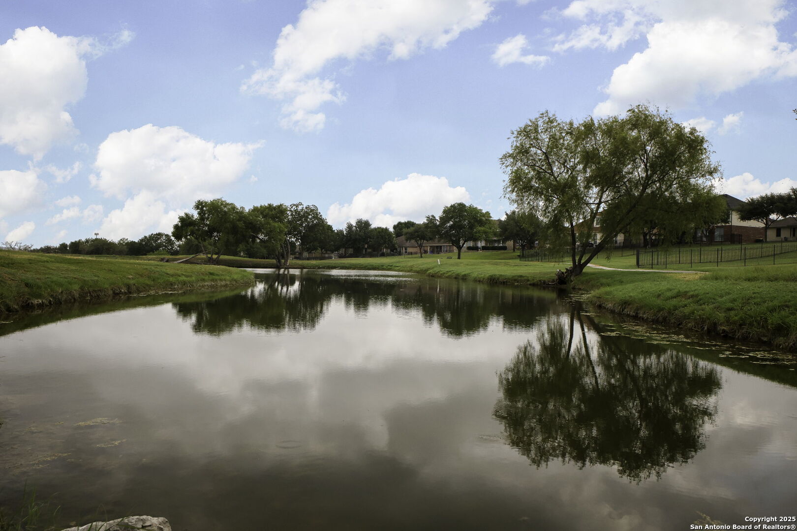3796 Pebble Beach Cibolo, TX 78108 - Photo 21 of 21 a view of a lake with a big yard