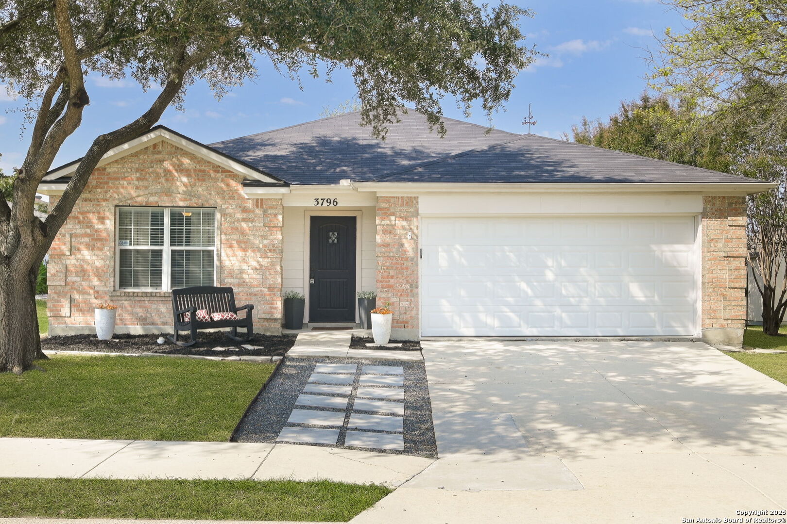 3796 Pebble Beach Cibolo, TX 78108 - Photo 3 of 21 a front view of a house with a yard