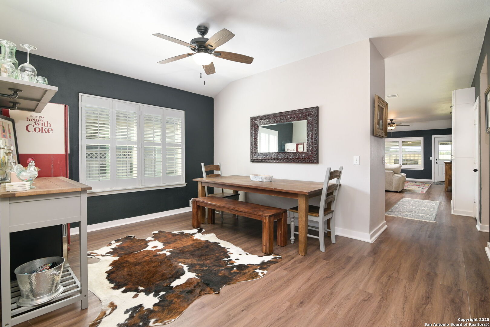 3796 Pebble Beach Cibolo, TX 78108 - Photo 7 of 21 a living room with furniture a fireplace and a table