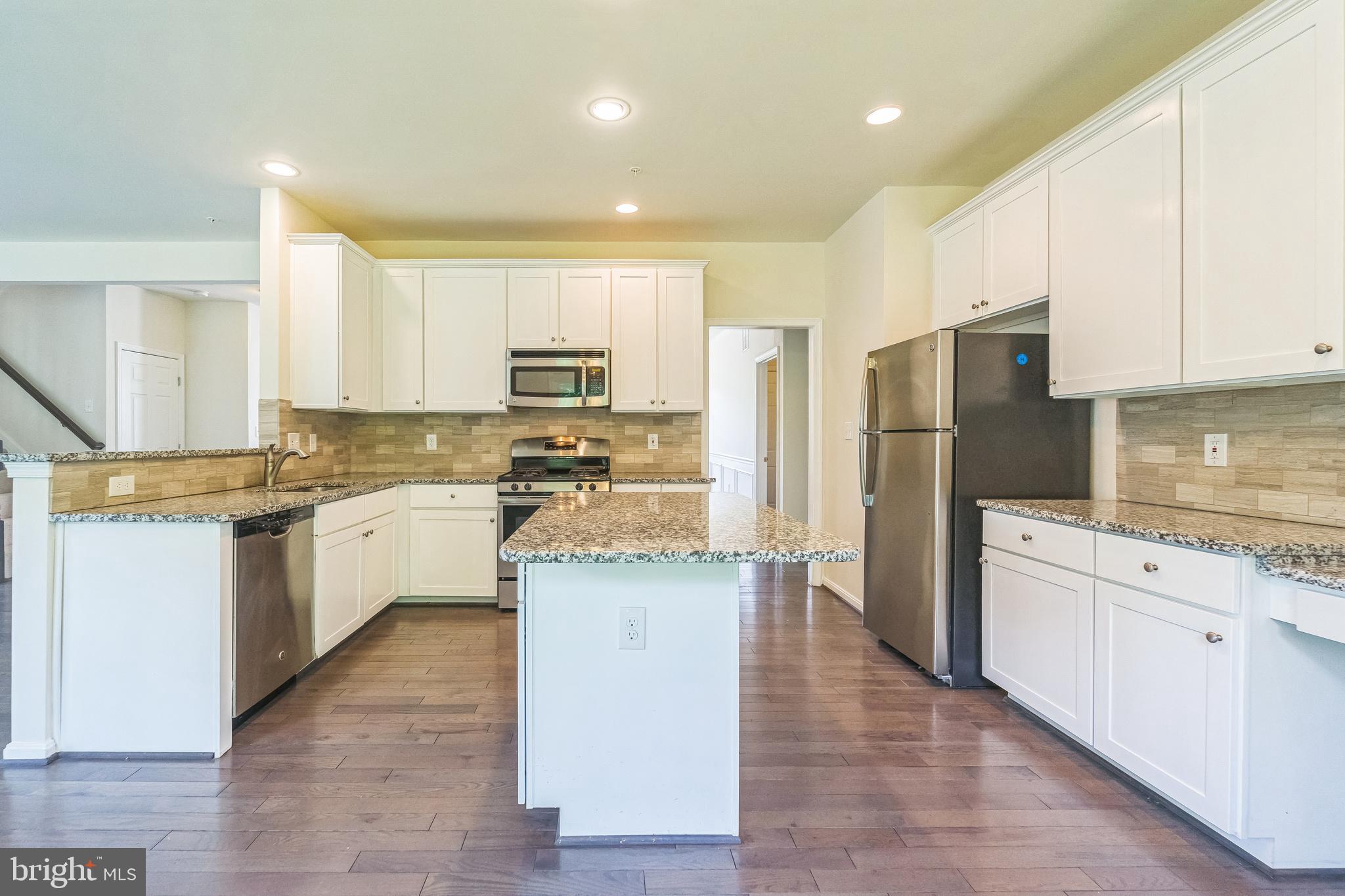 11305 Springpark Court Laurel, MD 20708 - Photo 13 of 48 Gourmet Kitchen with Granite Countertops