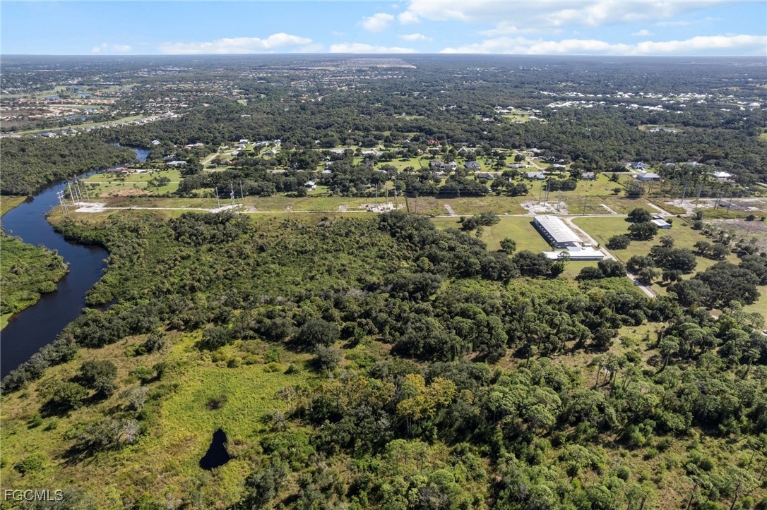 11281 Long Road Fort Myers, FL 33905 - Photo 15 of 24 an aerial view of residential house with outdoor space