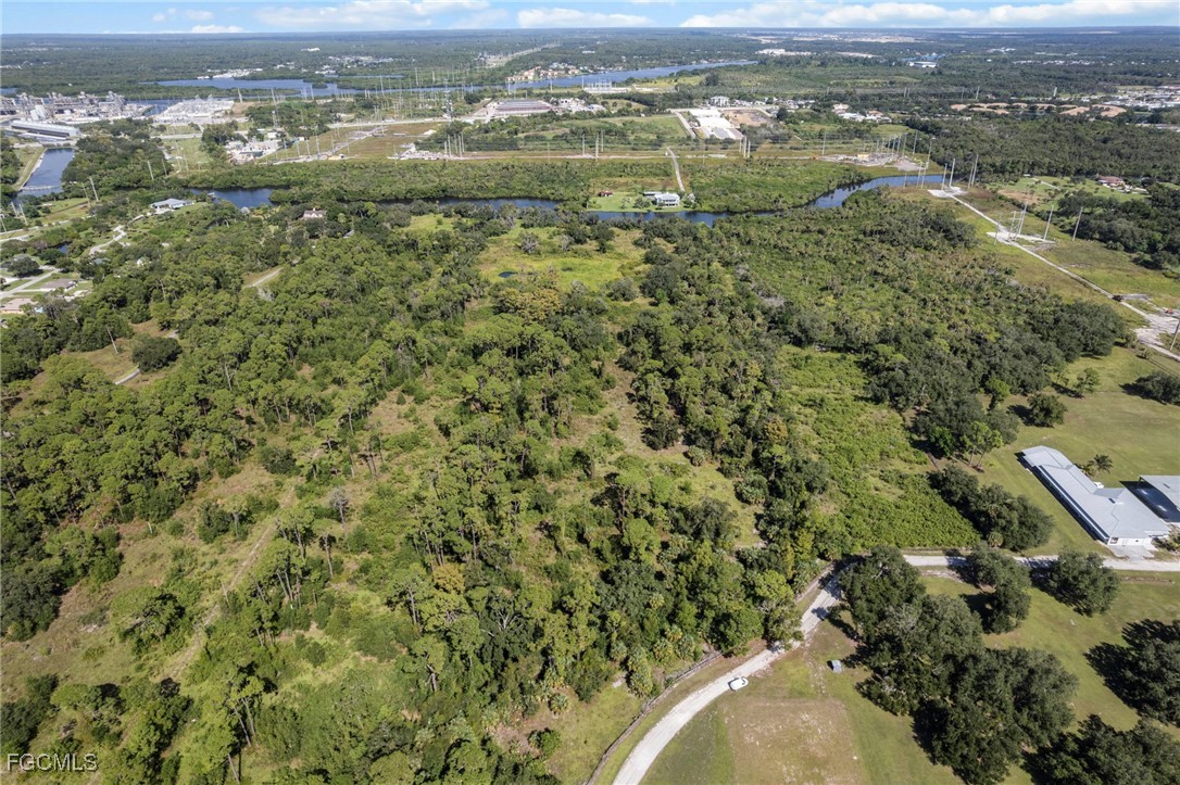 11281 Long Road Fort Myers, FL 33905 - Photo 24 of 24 an aerial view of residential houses with outdoor space and ocean view