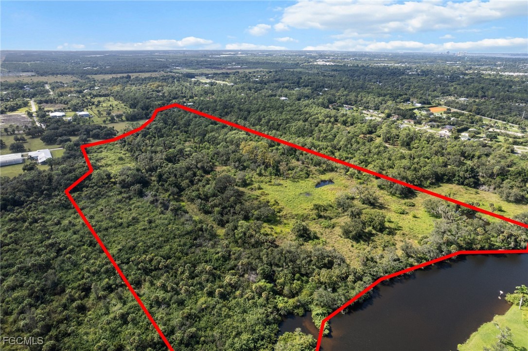 11281 Long Road Fort Myers, FL 33905 - Photo 8 of 24 a view of a outdoor space with a swimming pool