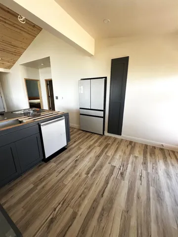 a bedroom with bed and window