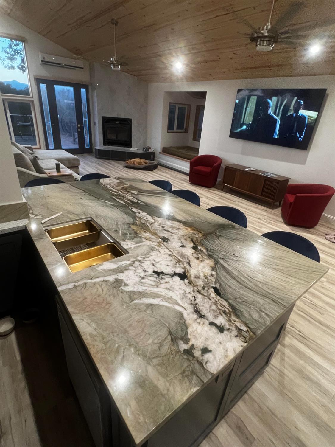 51571 Coyote Ridge Road Oakhurst, CA 93644 - Photo 17 of 81 a living room with furniture and a flat screen tv