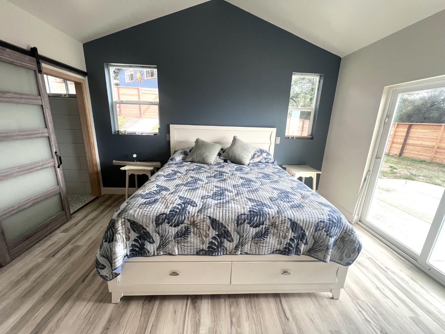 51571 Coyote Ridge Road Oakhurst, CA 93644 - Photo 20 of 81 a bed sitting in a bedroom next to a window