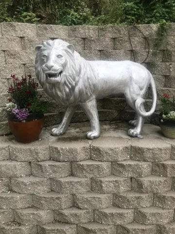 a large kitchen with stainless steel appliances granite countertop a stove and a refrigerator