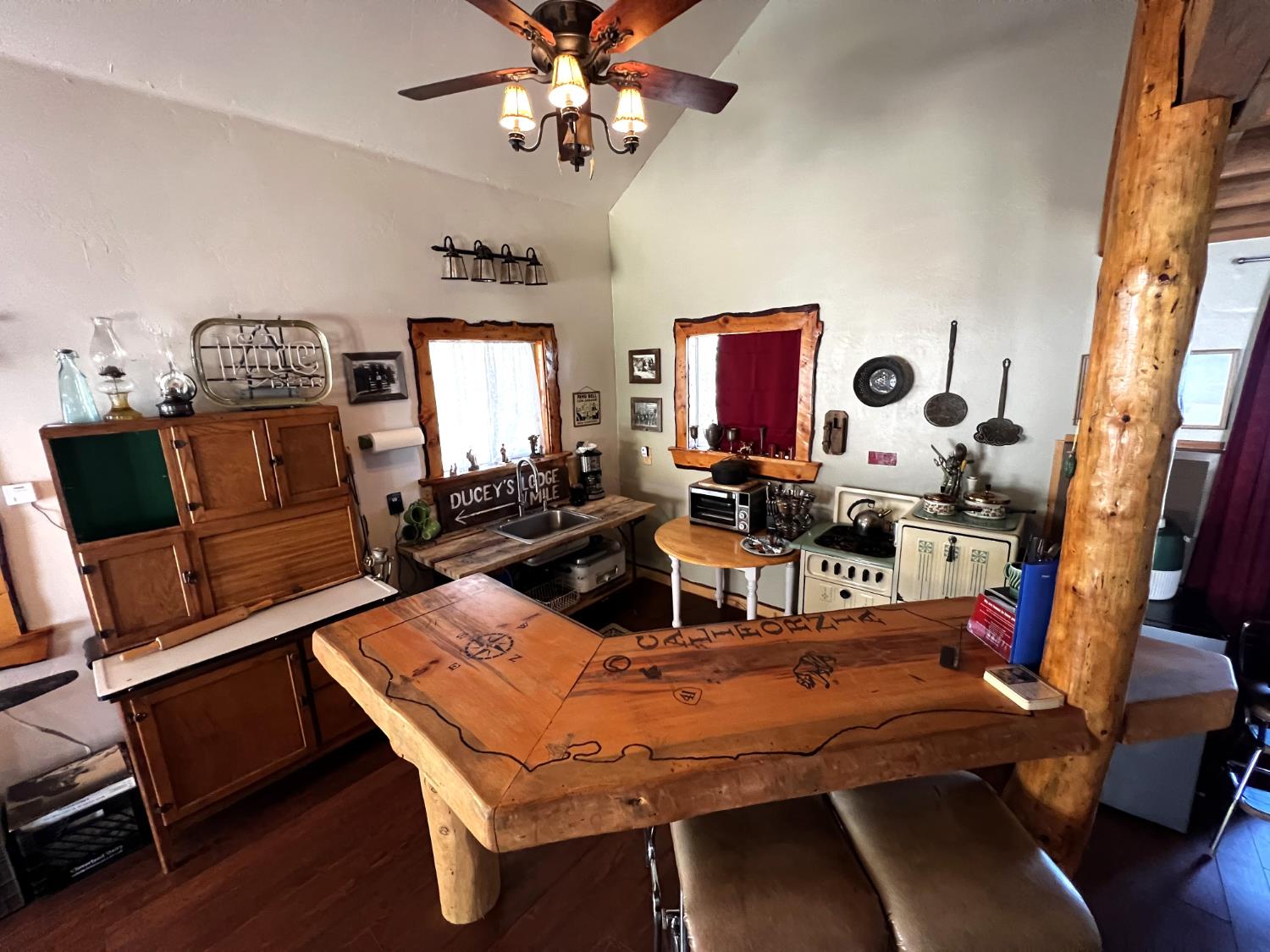 51571 Coyote Ridge Road Oakhurst, CA 93644 - Photo 51 of 81 a room with furniture and wooden floor