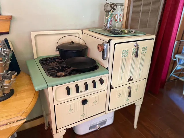 a backyard of a house with yard and outdoor seating