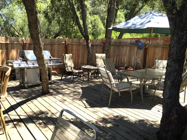 a kitchen with a stove a kitchen island a stove and a window