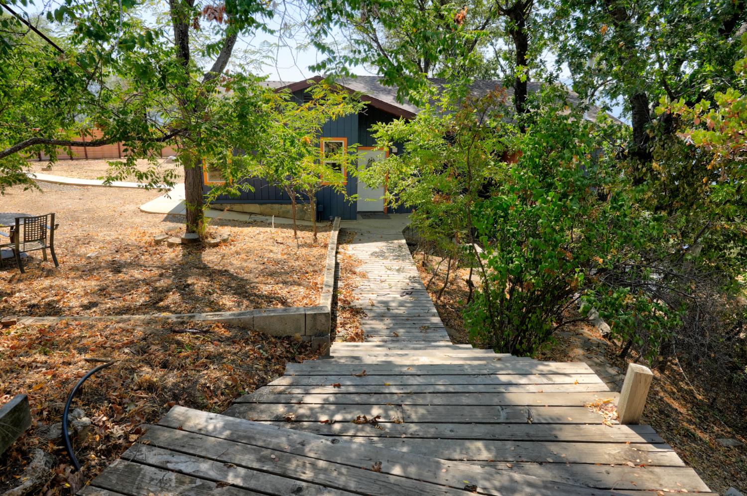 51571 Coyote Ridge Road Oakhurst, CA 93644 - Photo 6 of 81 Lovely walkway down to main house for guests.