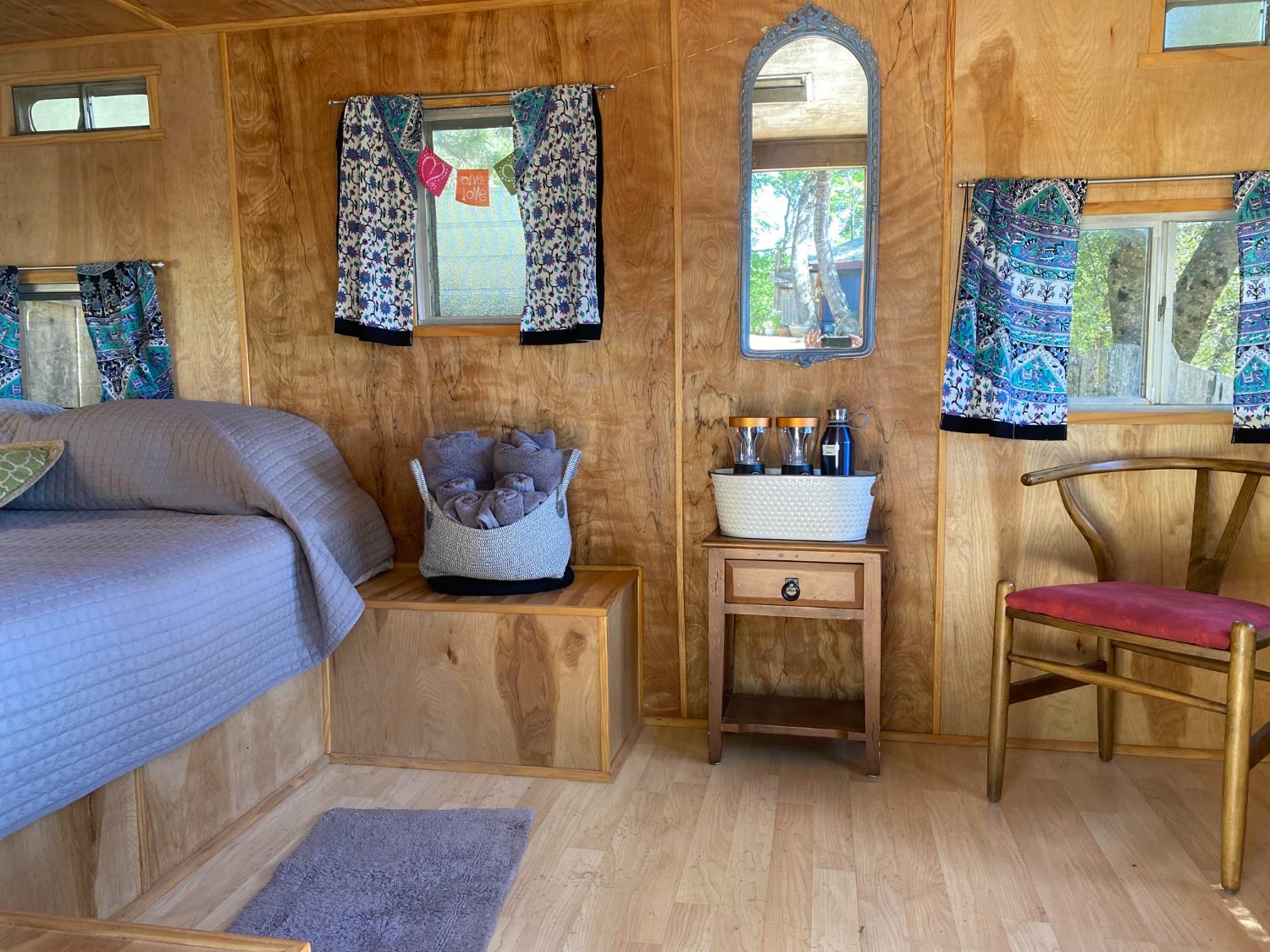 51571 Coyote Ridge Road Oakhurst, CA 93644 - Photo 71 of 81 a bedroom with furniture and a window