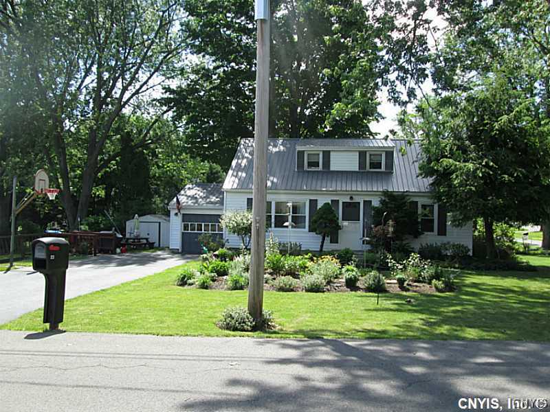 Exterior Front. Beautiful home on large corner lot