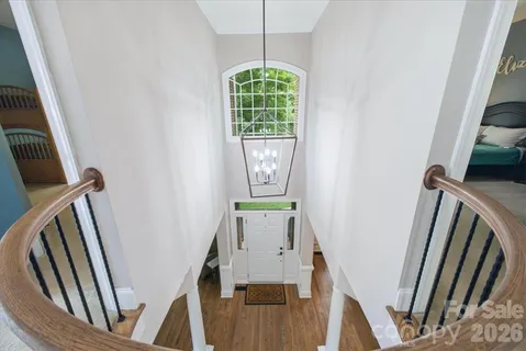 a view of entryway with wooden floor