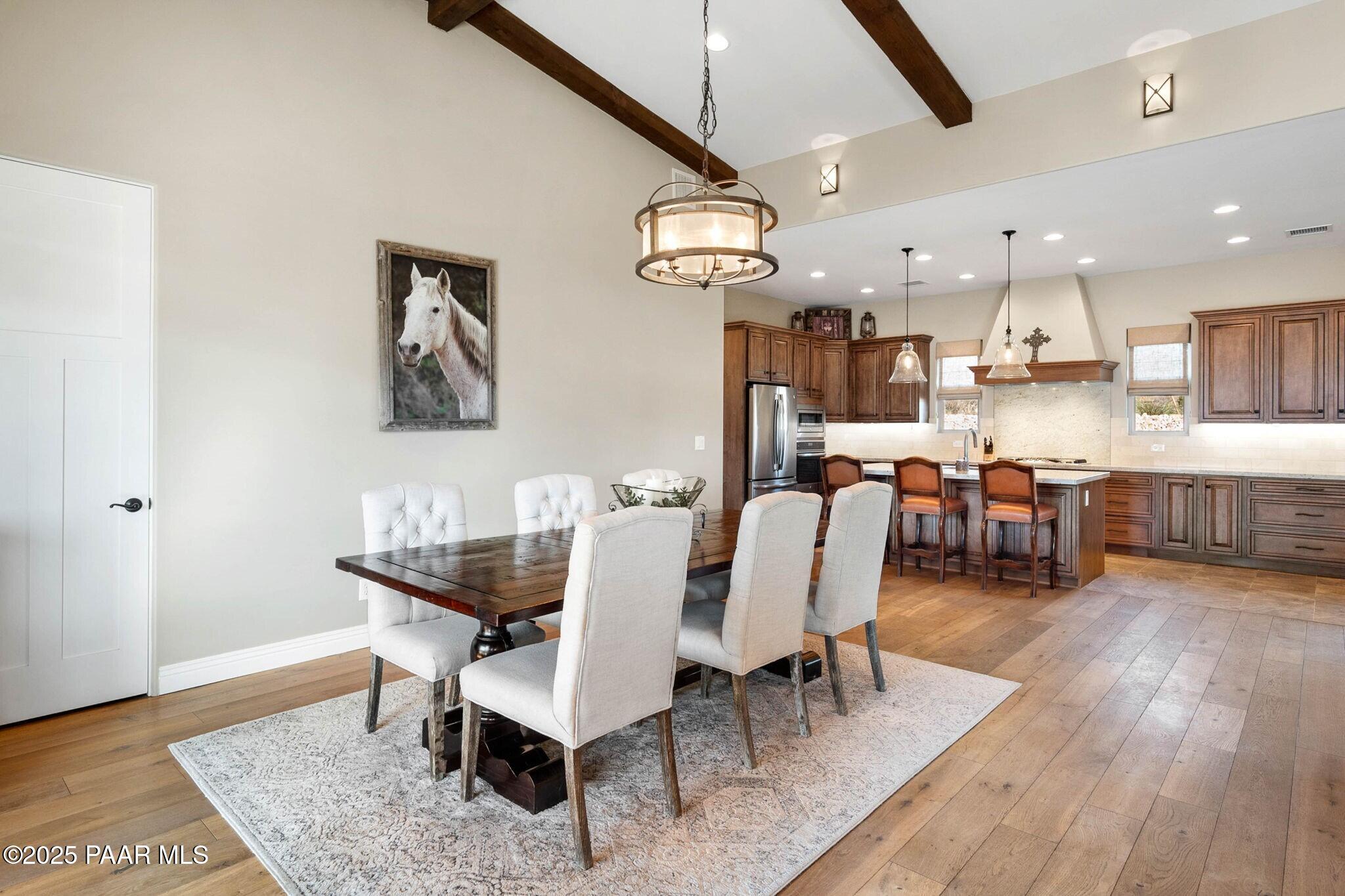 9309 North Callahan Road Prescott, AZ 86305 - Photo 11 of 55 a dining room with furniture and wooden floor