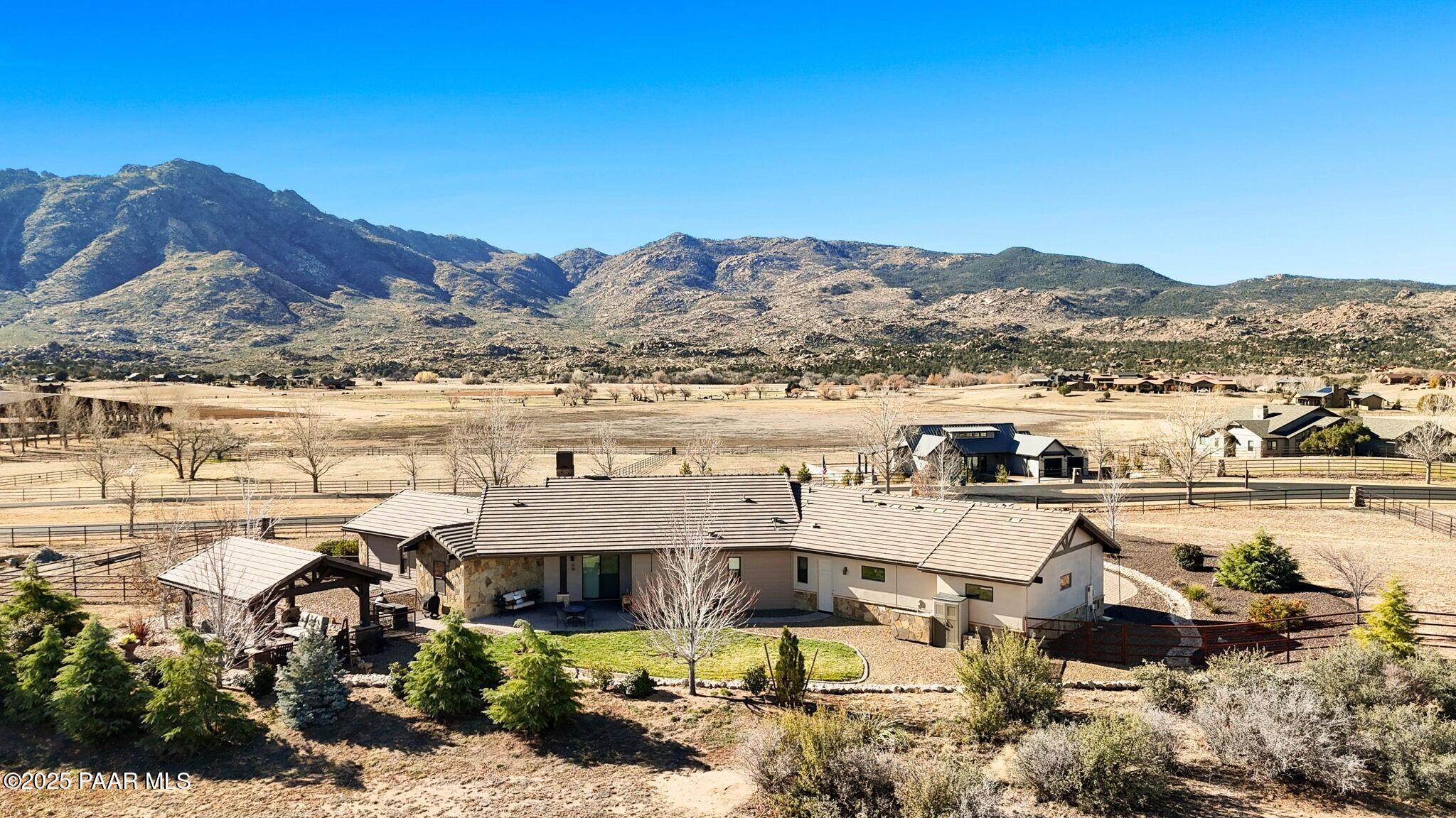 9309 North Callahan Road Prescott, AZ 86305 - Photo 32 of 55 a view of a lake with mountains in the background