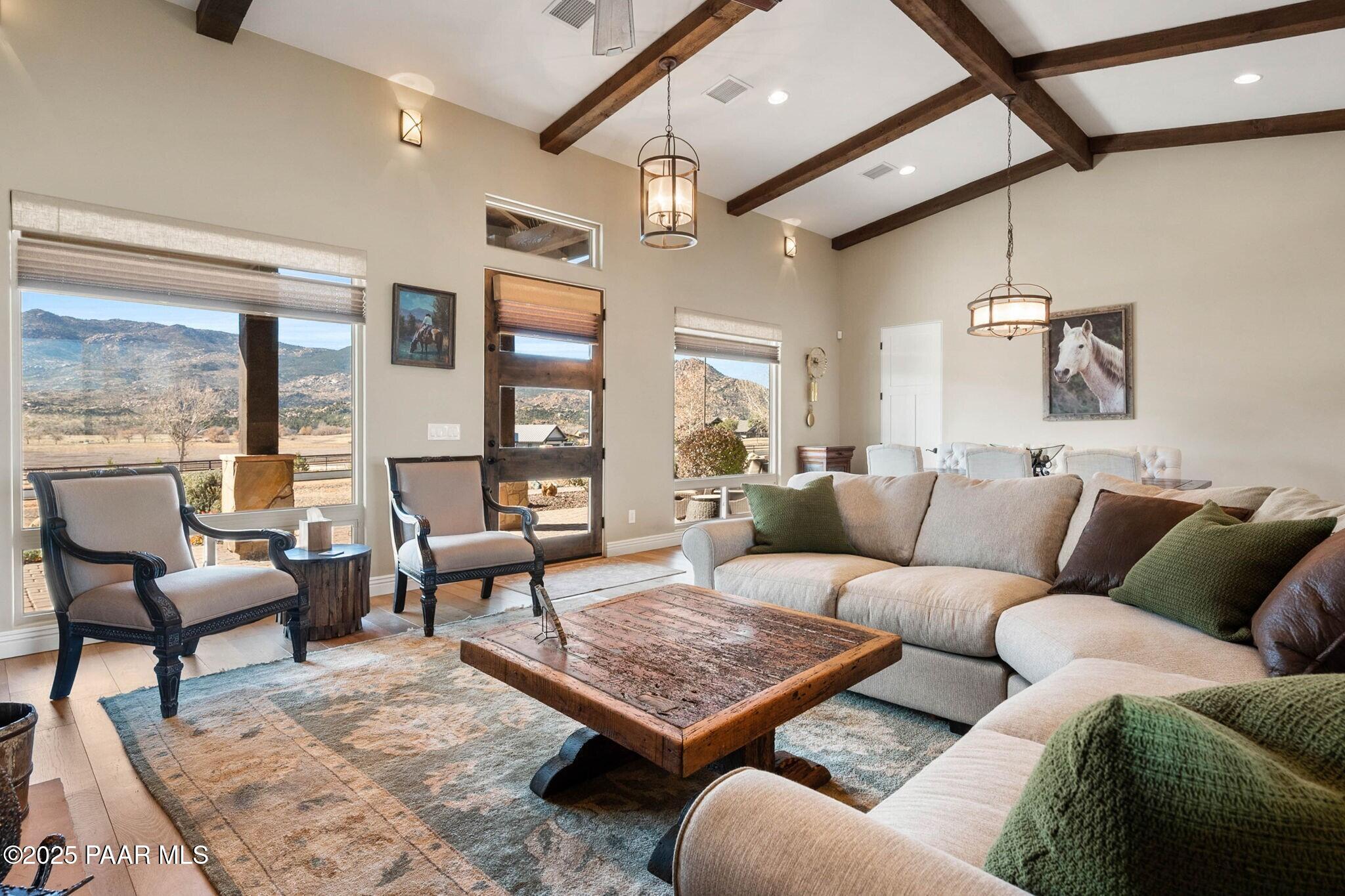 9309 North Callahan Road Prescott, AZ 86305 - Photo 4 of 55 a living room with furniture and a rug