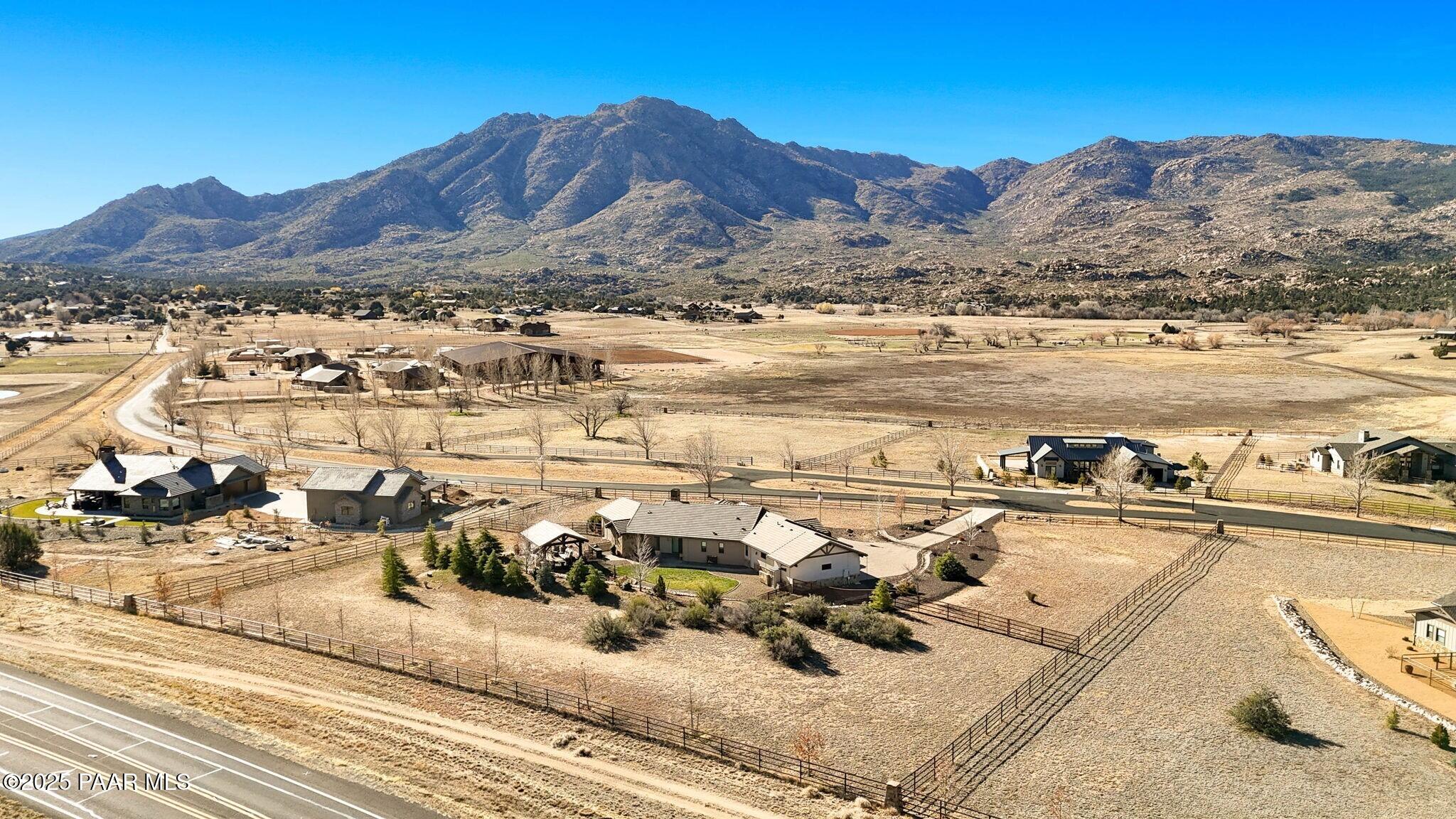 9309 North Callahan Road Prescott, AZ 86305 - Photo 50 of 55 a view of a terrace with outdoor seating and mountains in the background