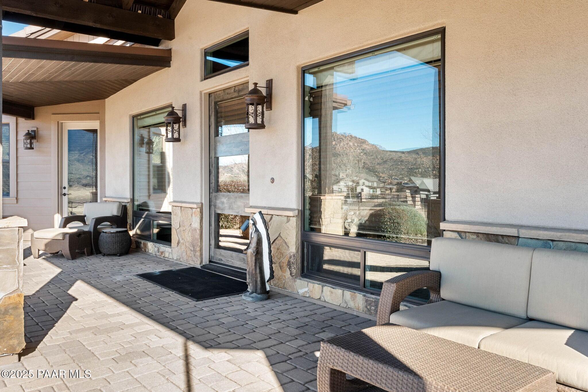 9309 North Callahan Road Prescott, AZ 86305 - Photo 7 of 55 a living room with furniture wooden floor and a large window