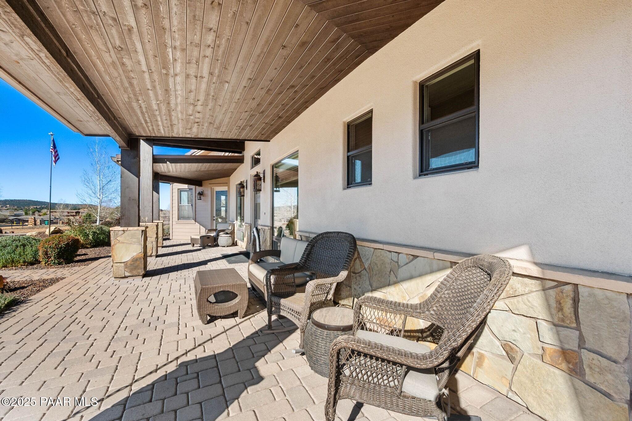 9309 North Callahan Road Prescott, AZ 86305 - Photo 8 of 55 a bedroom with furniture and a window
