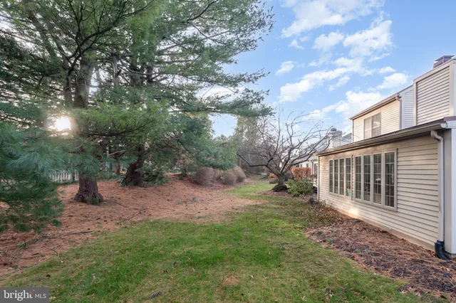 a backyard of a house with lots of green space
