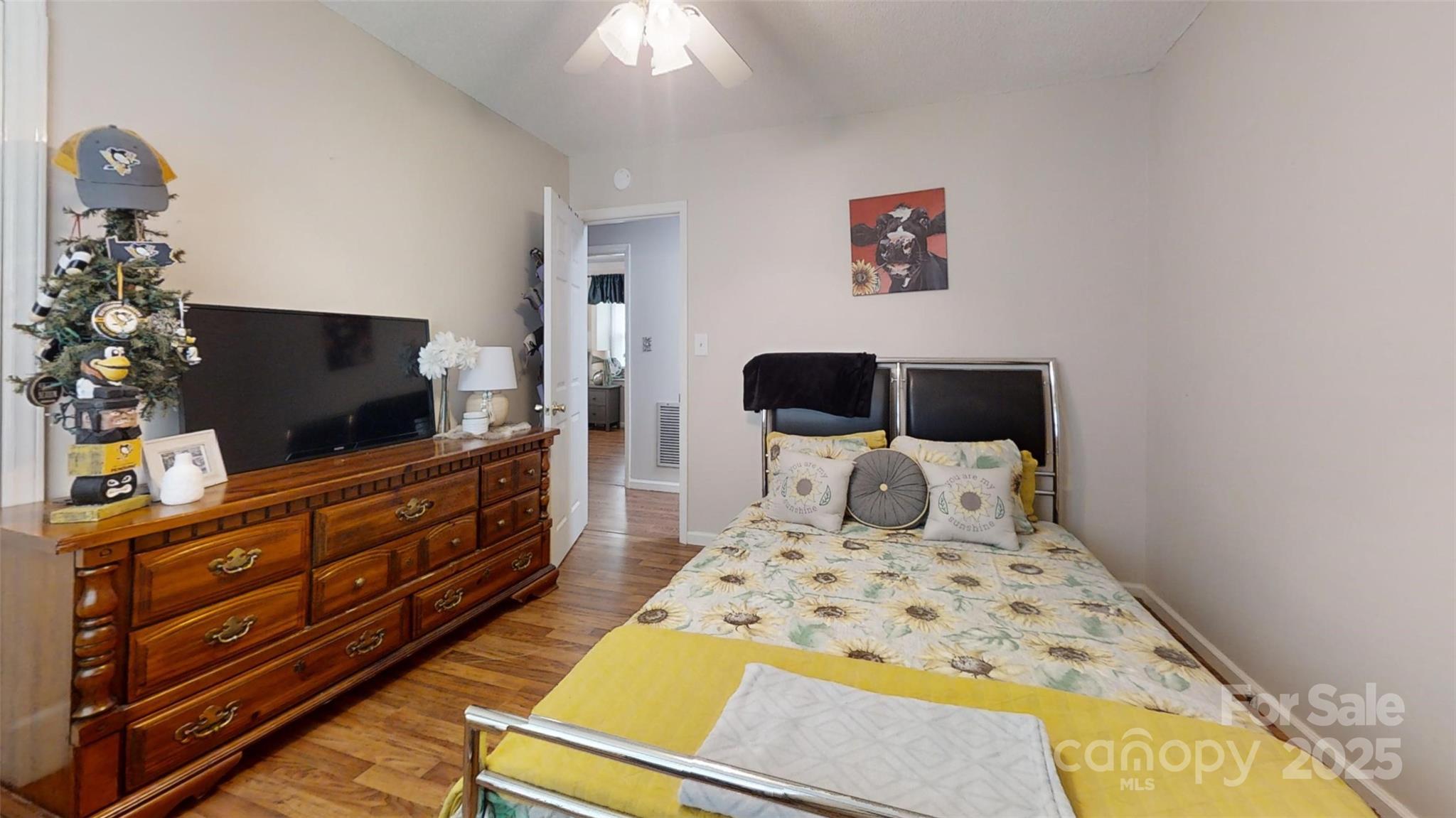 3816 Redman Road Shelby, NC 28150 - Photo 14 of 39 a bedroom with a bed and flat screen tv