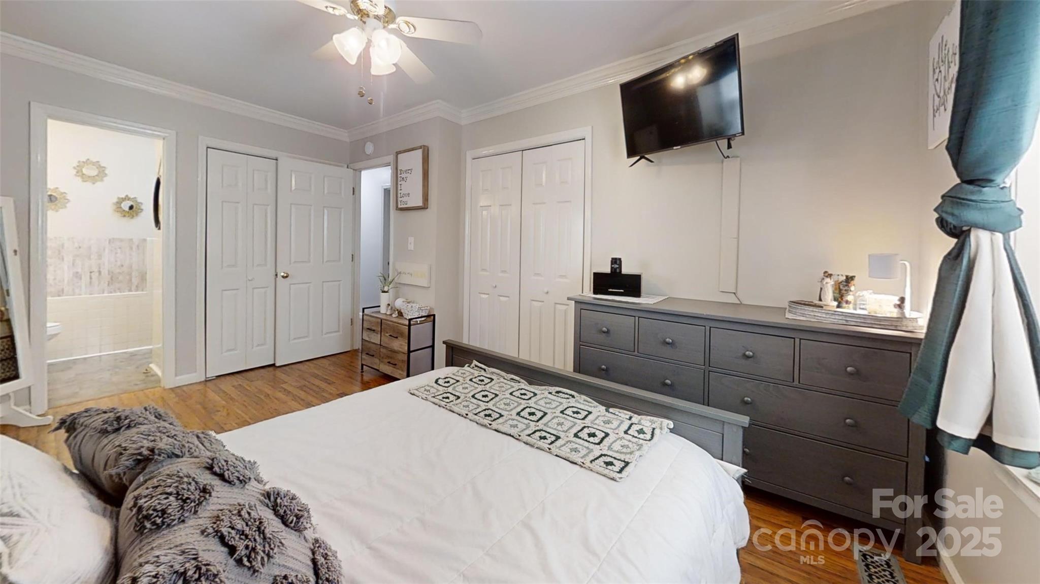 3816 Redman Road Shelby, NC 28150 - Photo 16 of 39 a bedroom with a bed and a flat tv screen on dresser
