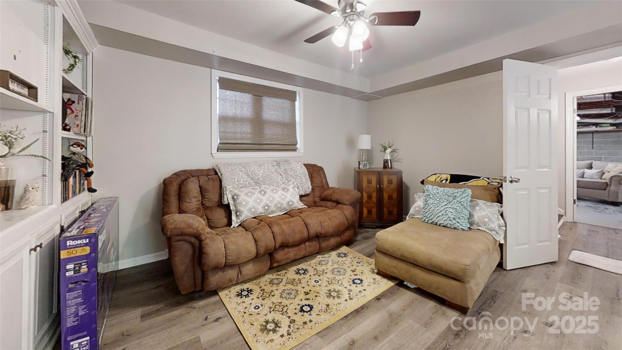 3816 Redman Road Shelby, NC 28150 - Photo 20 of 39 a living room with furniture and a fireplace