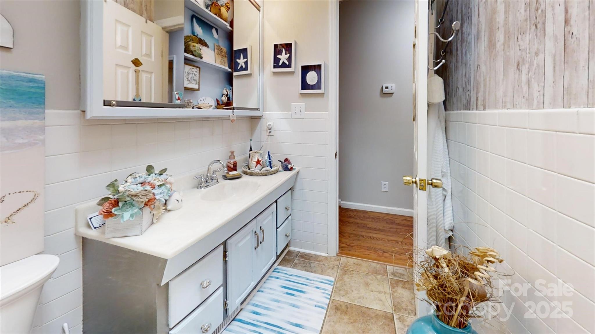 3816 Redman Road Shelby, NC 28150 - Photo 21 of 39 a bathroom with a sink and mirror