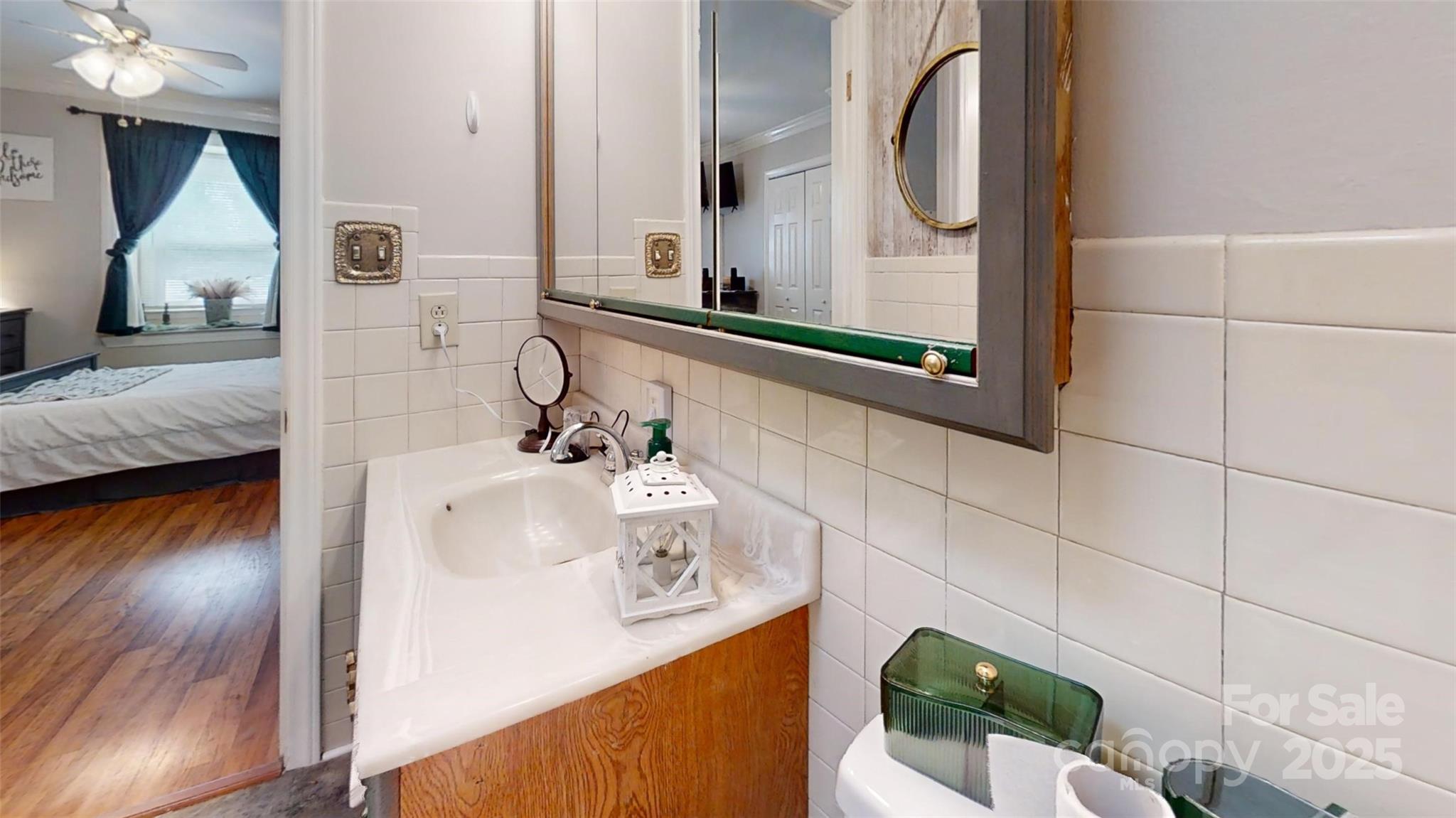 3816 Redman Road Shelby, NC 28150 - Photo 22 of 39 a bathroom with a sink mirror and vanity