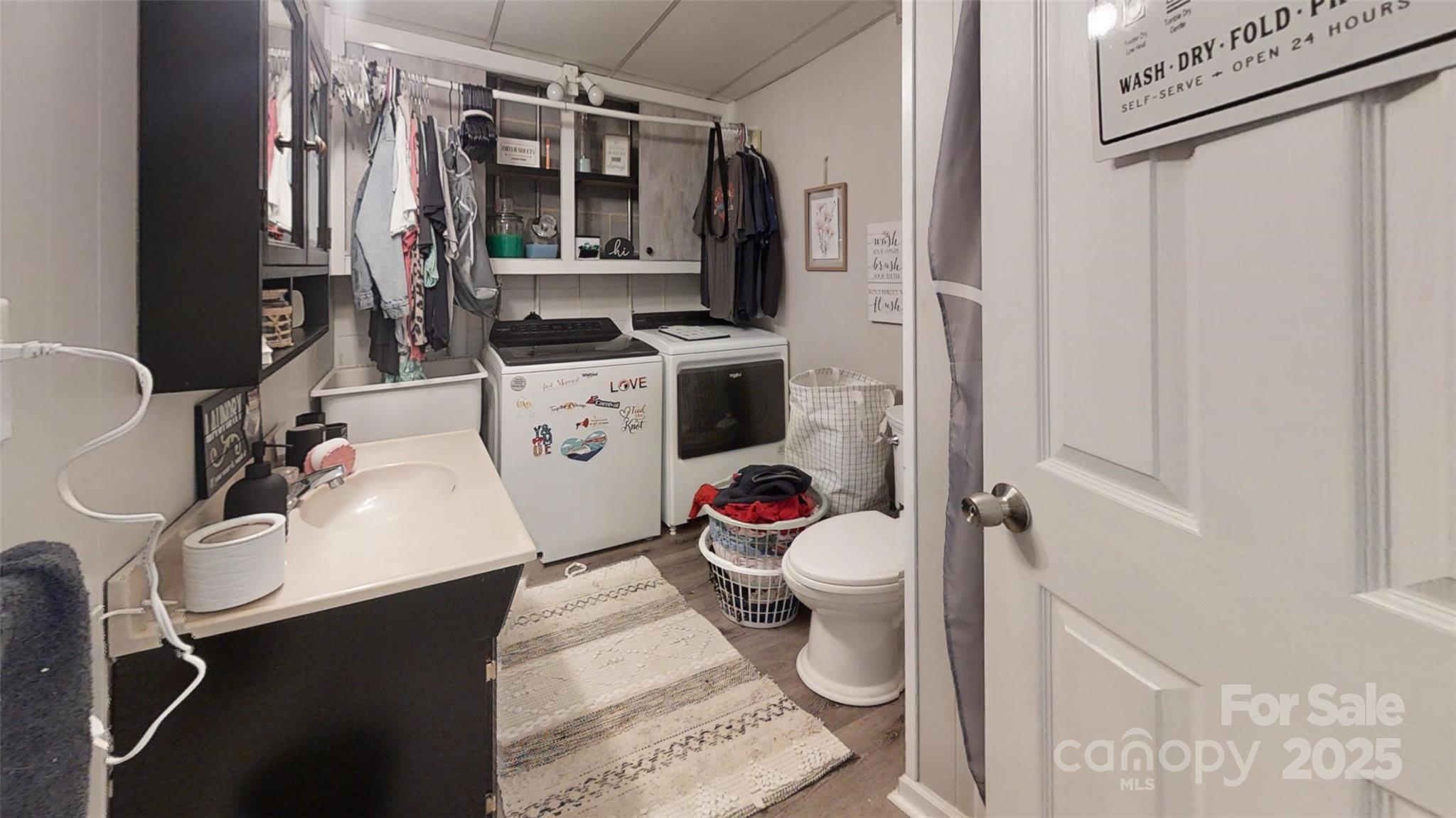 3816 Redman Road Shelby, NC 28150 - Photo 23 of 39 a bathroom with a sink toilet vanity and tub