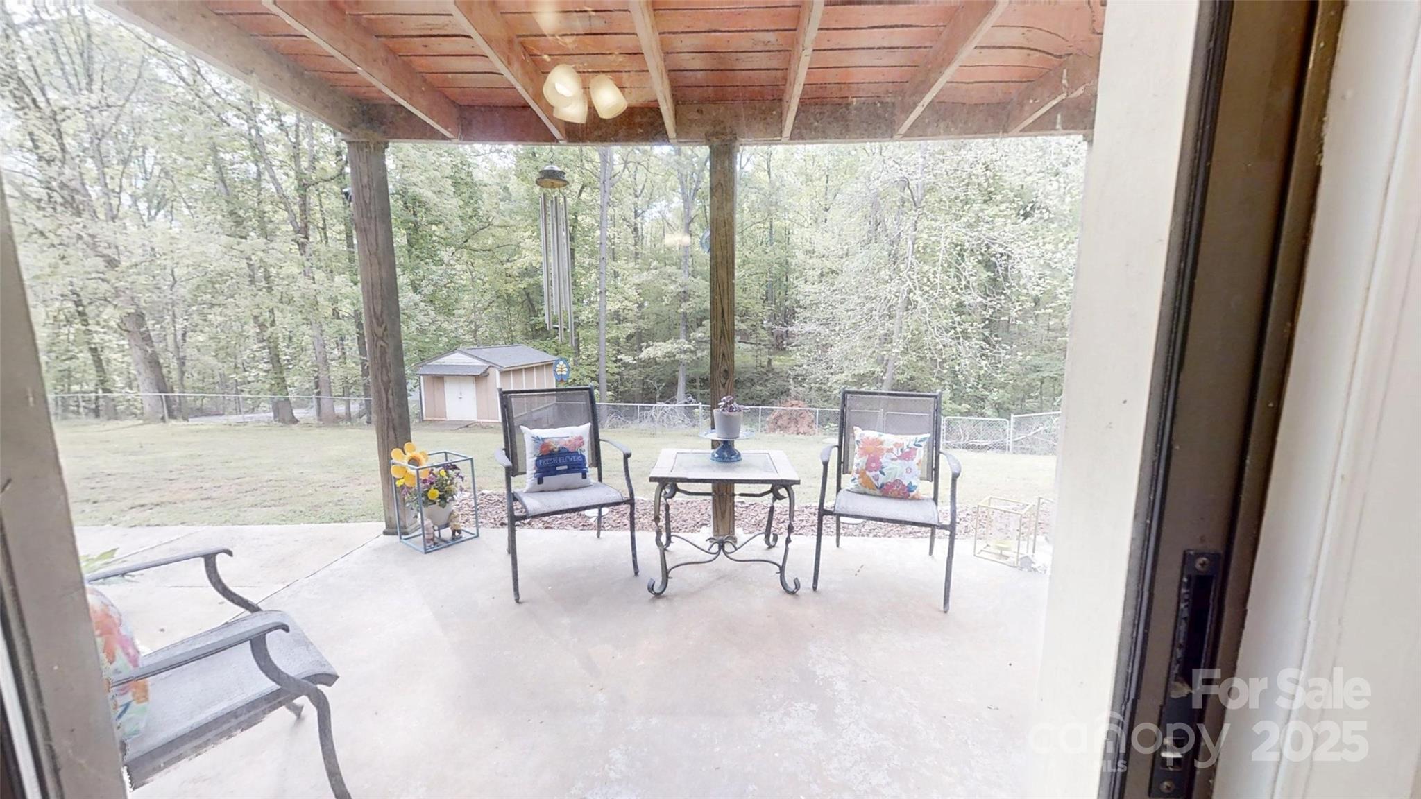 3816 Redman Road Shelby, NC 28150 - Photo 32 of 39 a dining room with furniture and a chandelier
