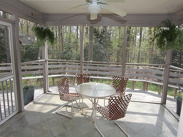 8013 Shellnut Road Raleigh, NC 27615 - Photo 21 of 25 Enjoy your beautiful yard from this serene screened porch. Screened Porch