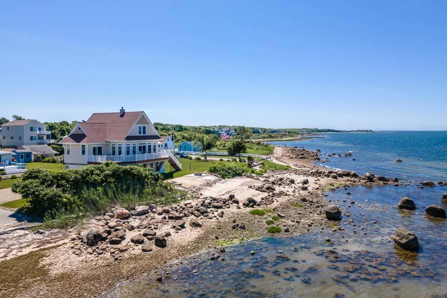 1 Calumet Road Fairhaven, MA 02719 - Photo 26 of 42 a view of a lake with beach and city view