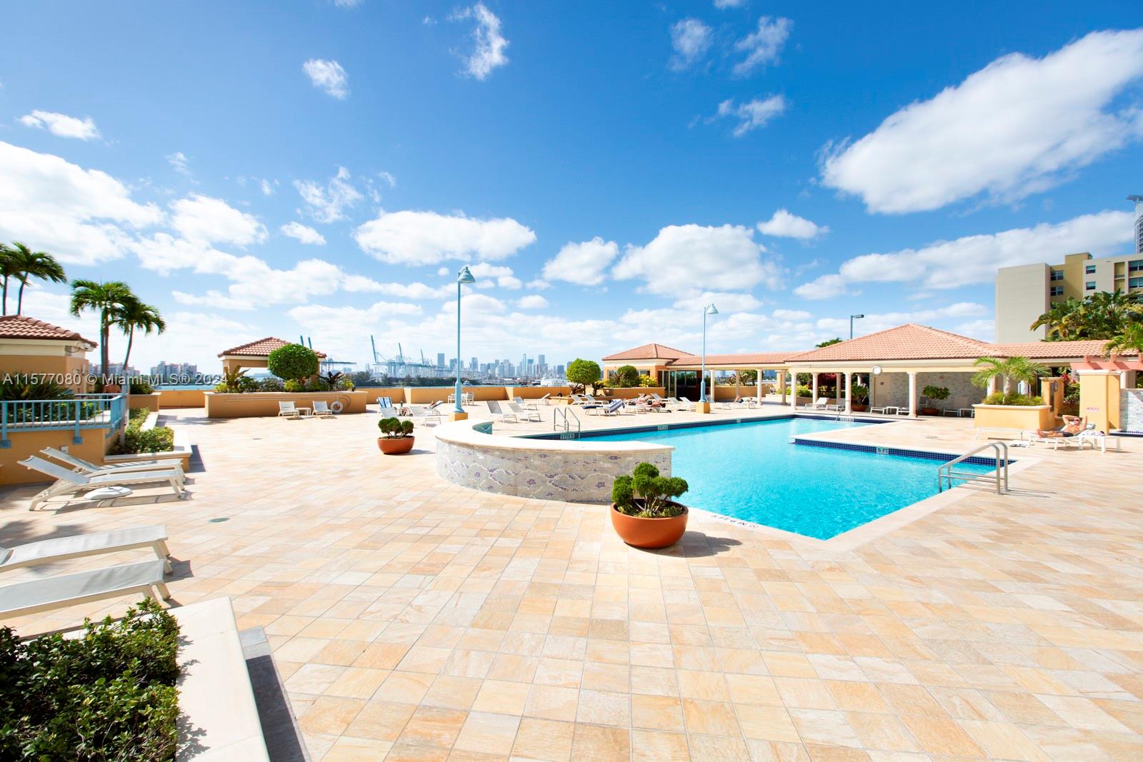 90 Alton Road, Unit 2907 Miami Beach, FL 33139 - Photo 17 of 18 a view of multiple houses with a yard